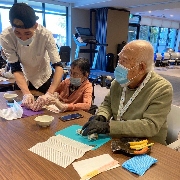 senior citizens making sushi, a hobby for the elderly