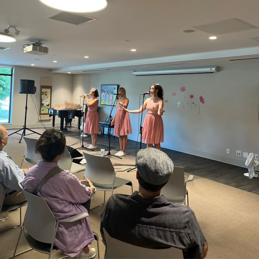 Singers performing for residents