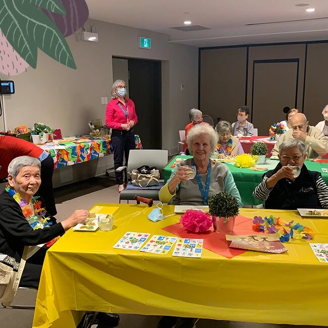 Senior citizens celebrating together in their senior home