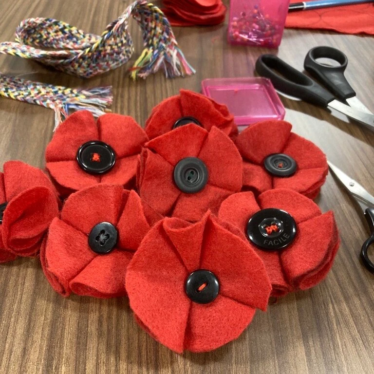 handmade Red poppies made as an activity for seniors