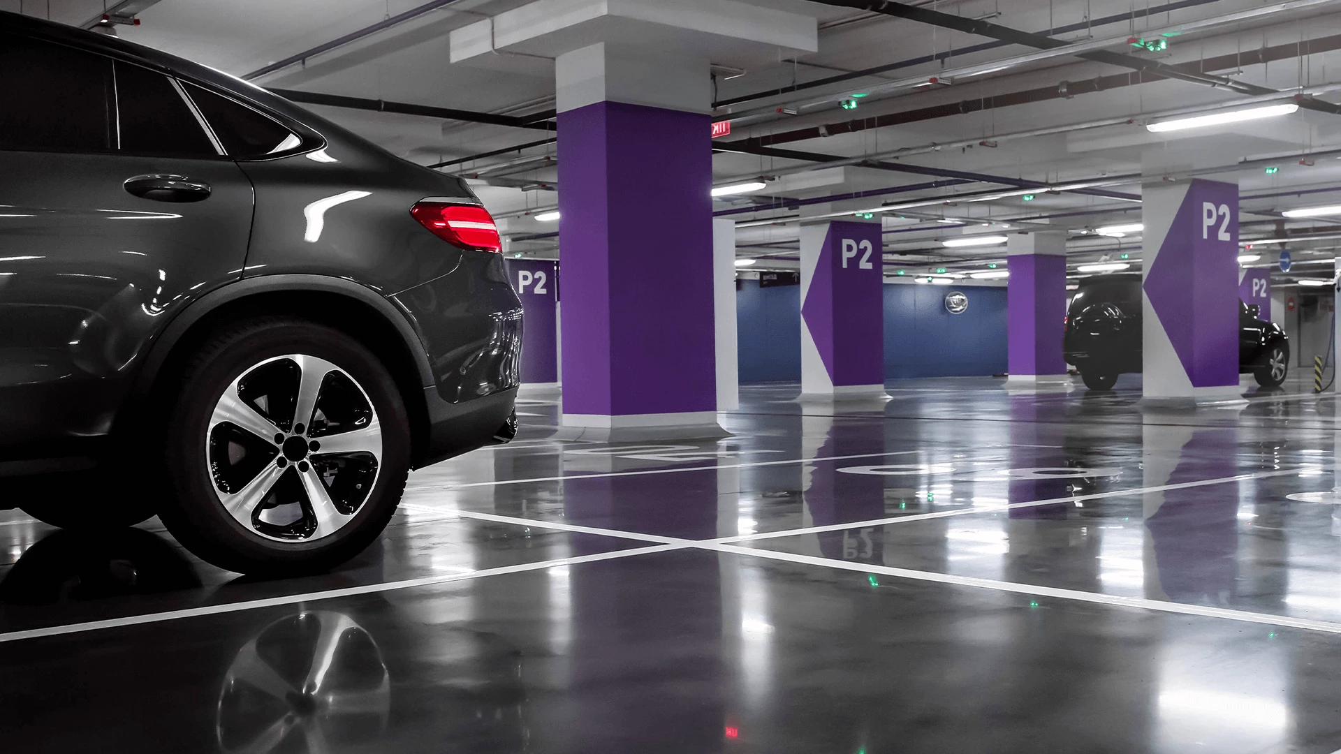 A car parked in an underground parkade in senior apartments