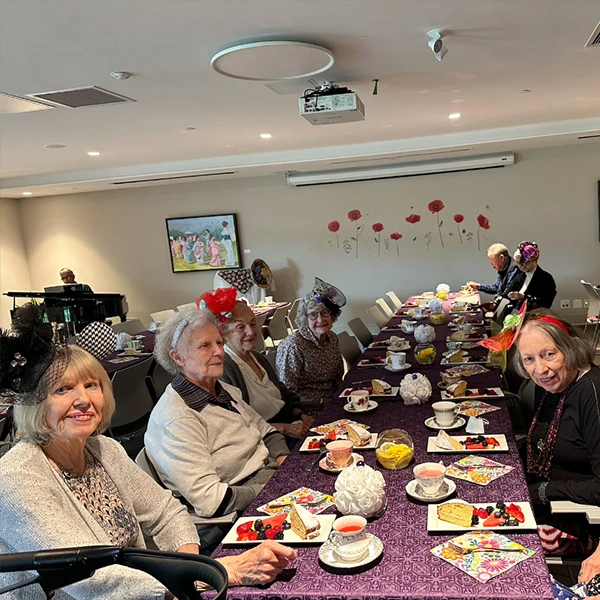 Seniors eating together at Wisteria Place
