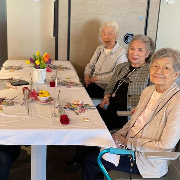 Three senior women seated together celebrating mother's day