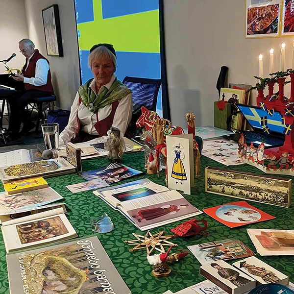 Senior displaying portions of her Swedish culture to others for Cultural Days.