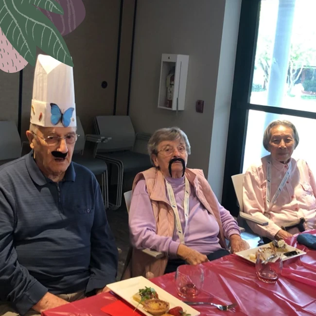 Seniors wearing chef hats